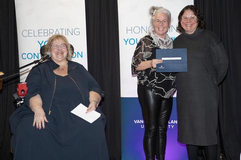 Eliza Gardiner being presented her Access and Inclusion Award by the President and Linda Derskson.jpg